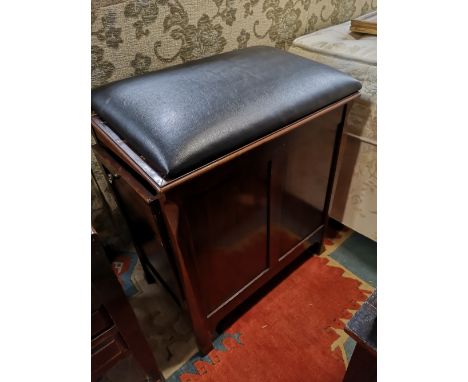 An antique storage stool 