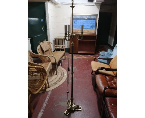 A heavy quantity brass standard lamp. 