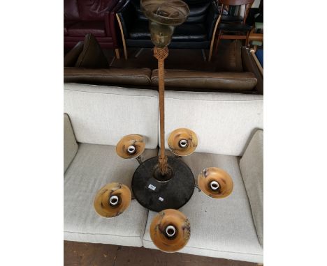 A mid century ceiling light with five way glass shade. 