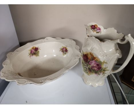 A gilt highlighted transfer printed jug and basin set 