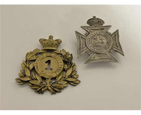 Two Edwardian helmet plates, 1st foot and Kaffrarian rifles