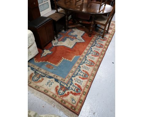 A fringed Eastern carpet, 370cm by 262cm CONDITION REPORT: This appears to be in good condition but requires cleaning. 