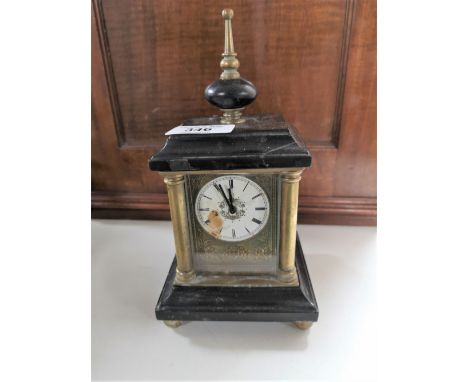 A nineteenth century continental carriage clock on slate and brass