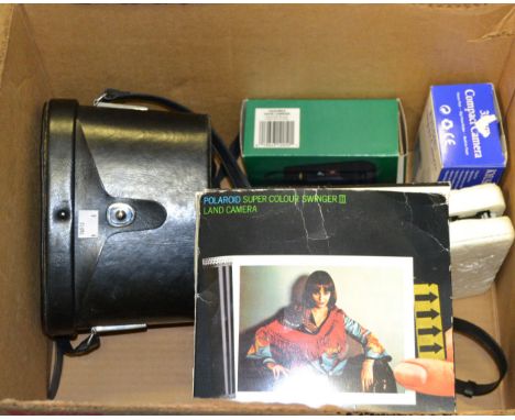 A polaroid camera, boxed; a Hanimex slender camera with flash, binoculars, etc (1 box)