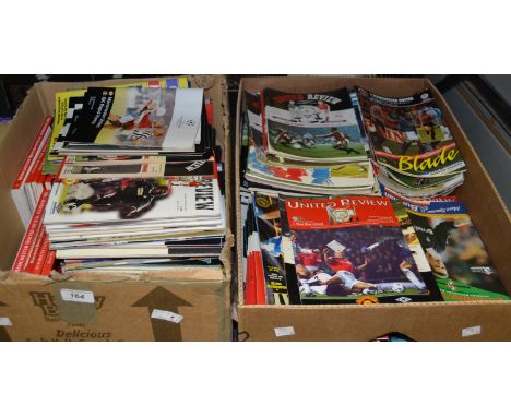 Sporting memorabilia - Manchester United FC match day programmes from the 1990 season through to 1999; etc qty (2 boxes)