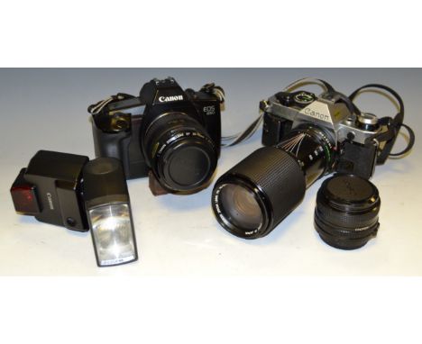 Photographic Interest - a Canon AE1 with FD70-210 zoom lens; another lens; A E05 Camera 35.70 zoom lense and Speedlight Flash