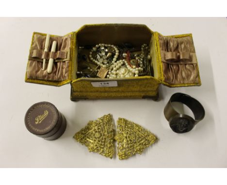 A Victorian velvet covered sewing box containing various costume jewellery, buckles, stick pins etc. 