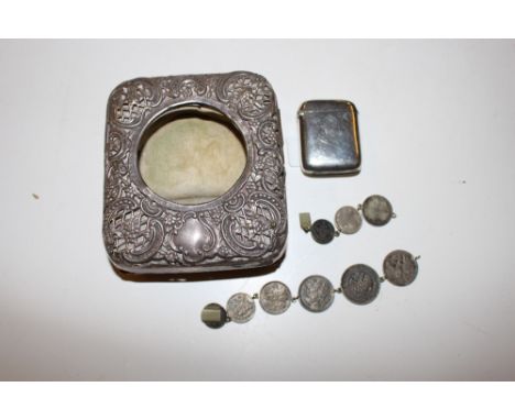 A silver vesta case; a silver mounted clock case; and a Russian bracelet