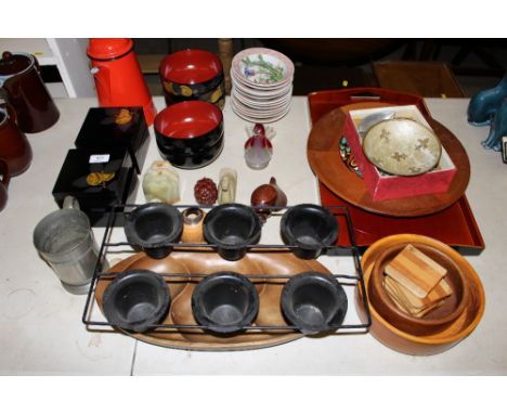 A red enamel coffee pot; lacquered bowls and boxes; an Art glass paperweight in the form of a bird; turned wooden bowls etc.