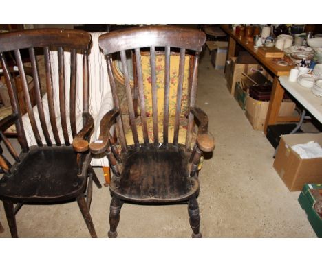 An elm seated stick back elbow chair