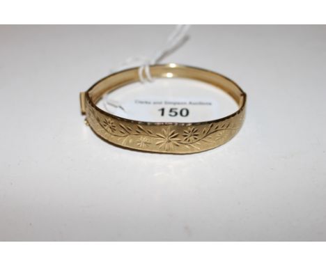 A 9ct gold bangle 
