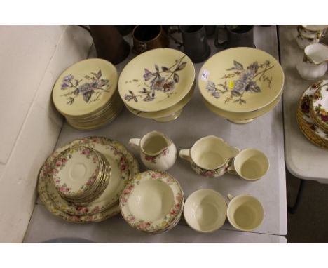 A quantity of late Victorian floral decorated dessertware and a quantity of Royal Doulton 'English Rose' meat plates, saucers