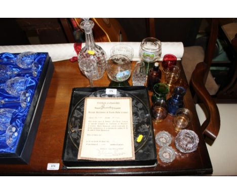 A quantity of various glassware to include a decanter and a commemorative plate