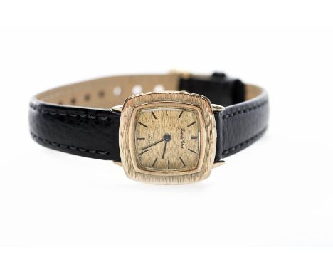 LADY'S BUECHE GIROD WRISTWATCH
manual wind movement, the textured gold dial with baton hour markers, blued steel hands, unmar