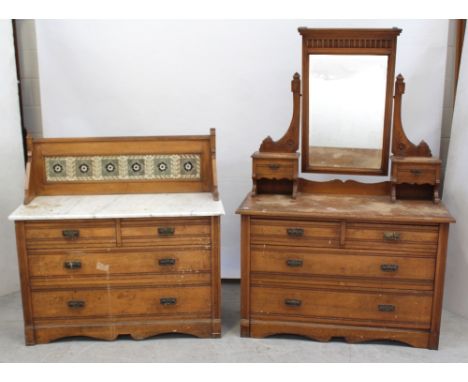 A Victorian Aesthetic period oak dressing chest, the swing mirror mounted on twin jewellery boxes over a two-over-two drawer 