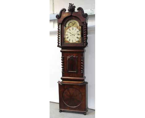 A late 18th century mahogany North Country longcase clock, the rolling moon arched dial set with Roman numerals and subsidiar