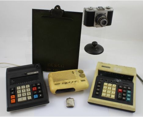 Two vintage calculators, an Adler 1214 and an Office Vatman Super example, a vintage Alba alarm clock radio, a vintage green 