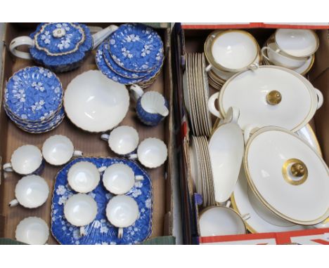 A quantity of Royal Doulton 'Royal Gold' H4980 dinnerware to include tea plates, side plates, soup bowls, large oval platter 