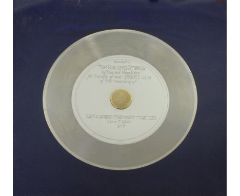 A rare Rolling Stones mother disc, silvered and engraved as a presentation disc by 'Disc and Music Echo' for the sale of over