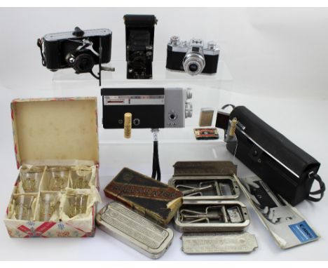 A small group of collectibles to include vintage bellows cameras, one by Coronet, a Halina 35mm camera, a Rolls razor sharpen