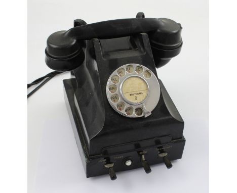 A vintage black AEP telephone. CONDITION REPORT No chips or cracks to the Bakelite. Losses to the paint on the switch base.