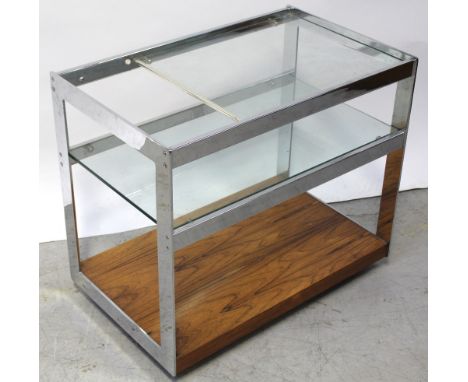 Merrow Associates; a 20th century Richard Young rosewood and chrome cocktail drinks trolley, glass top and centre glass shelf