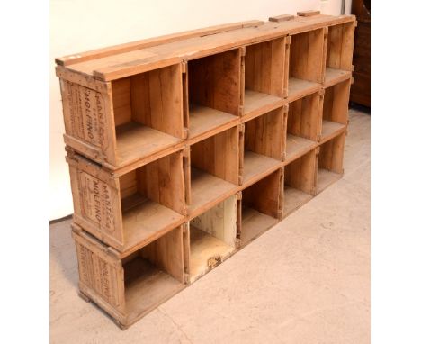 Fifteen vintage industrial packing cases from Argentina, stacked as one complete unit for display purposes, approx 106 x 146c