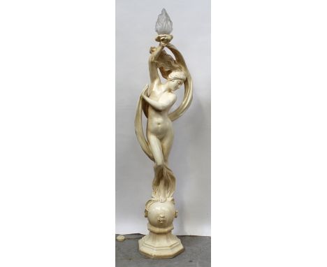 A white painted figural standard lamp modelled as a nude female with trailing scarves holding aloft a flaming lantern, figure