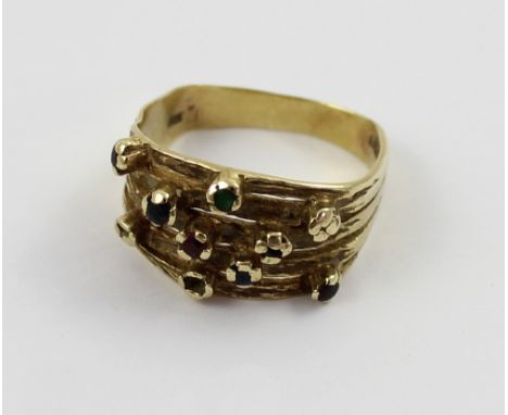 A 9ct gold ladies' dress ring set with various coloured stones, size P1/2, approx 4.5g (lacking one stone).