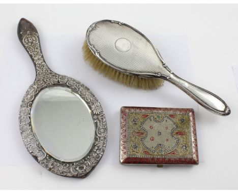 A hallmarked silver hand mirror, a hallmarked silver backed hand brush and an Indian white metal and enamel cigarette  case (