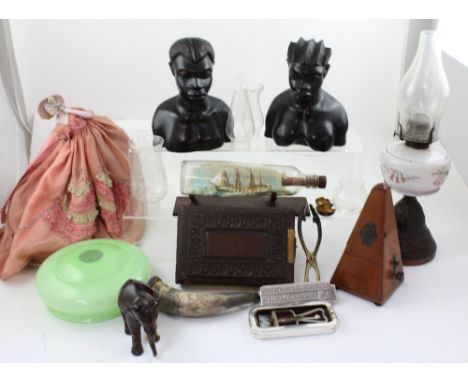 A mixed lot of collectibles to include an iron and milk glass paraffin lamp, a selection of glass smoke stacks, a Rolls razor