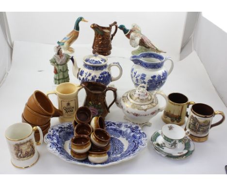 A mixed lot of ceramics to include copper lustre ware, a Rockingham-style teapot, brown glazed oven-to-table ware, blue and w