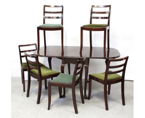 A mahogany drop-leaf dining table on cabriole legs to pad feet, width 90cm and a set of 1970s mahogany ladder-back chairs wit