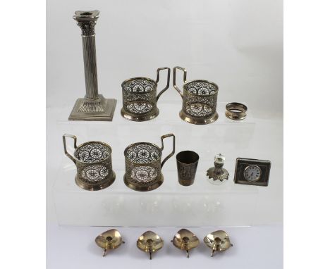 A group of silver and plated wares to include an Elizabeth II hallmarked silver bedside clock, the dial set with Roman numera