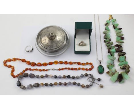 A small collection of costume and silver jewellery to include a George V silver-mounted powder jar, a silver and malachite pe