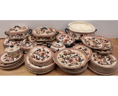 A quantity of late 19th century dinner ware in the Imari palette and gilt-heightened, to include dinner plates, side plates, 