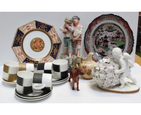 A mixed group of ceramics to include a floral-encrusted cherub vase by Moore, height 16.5cm, a Wedgwood Imari pattern octagon