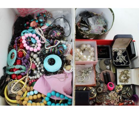 A large quantity of vintage and contemporary costume jewellery to include necklaces, bead bangles, brooches, earrings, diaman