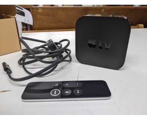 An Apple TV model A1842, 100-240v, with remote, and plug lead Location: 