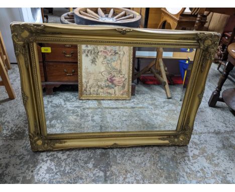 A selection of six various wall mirrors and a ceiling light to include a contemporary rectangular gilt framed mirror with bev