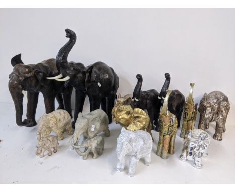 A collection of model elephants including Indian style examples Location: 