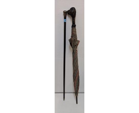 A silver topped walking stick and an umbrella with a dog head handle, Aramis, Location:A2F 