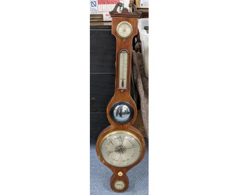 A 19th century mahogany and boxwood inlaid banjo barometer with silvered dial signed J Della Torre, Perth, 95cm h Location: 