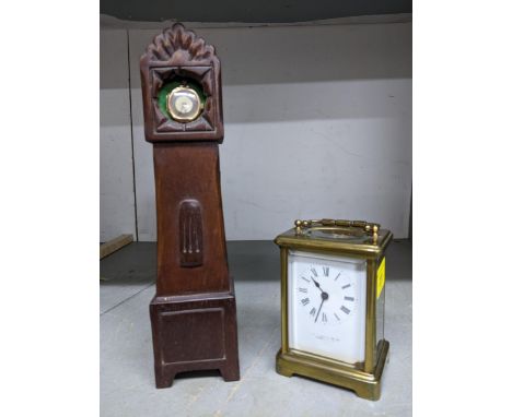 A brass case five window carriage clock, white enamel roman dial marked with retailers name L.N. Hubuay & co Birmingham, alon