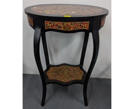 A reproduction of a 19th century French boule style table, painted with gilt highlights, black lacquered and with shelf below