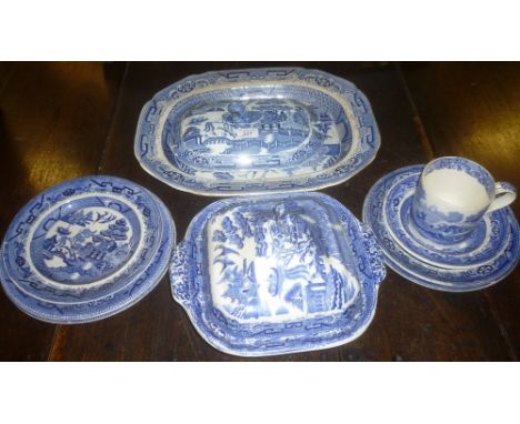 A Victorian Staffordshire pottery oval meat platter with blue &amp; white willow pattern decoration, 19th Century square two 