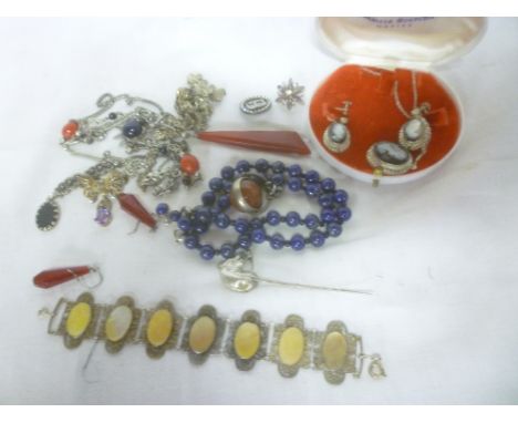 A selection of various costume jewellery including beadwork necklaces, horse stick pin, etc