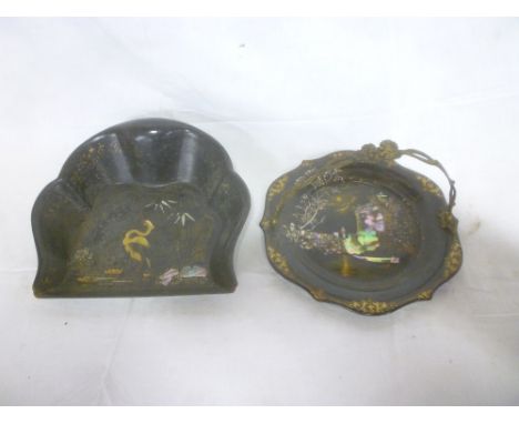 A Victorian lacquered paper mache circular serving basket with inlaid mother of pearl decoration and brass swing handle toget