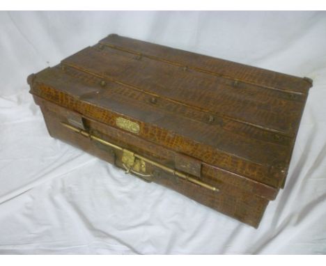 An unusual 19th Century japanned metal rectangular trunk with crocodile skin-effect decoration by James Brothers with brass l
