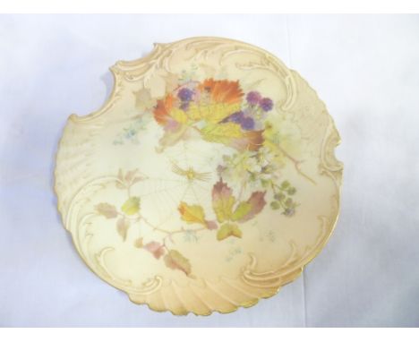 A Royal Worcester china circular serving dish with painted fruit and spider decoration 